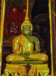 The statue of the Emerald Buddha (Phra Kaeo Morakot) in the Temple of the Emerald Buddha - Wat Phra Kaew.